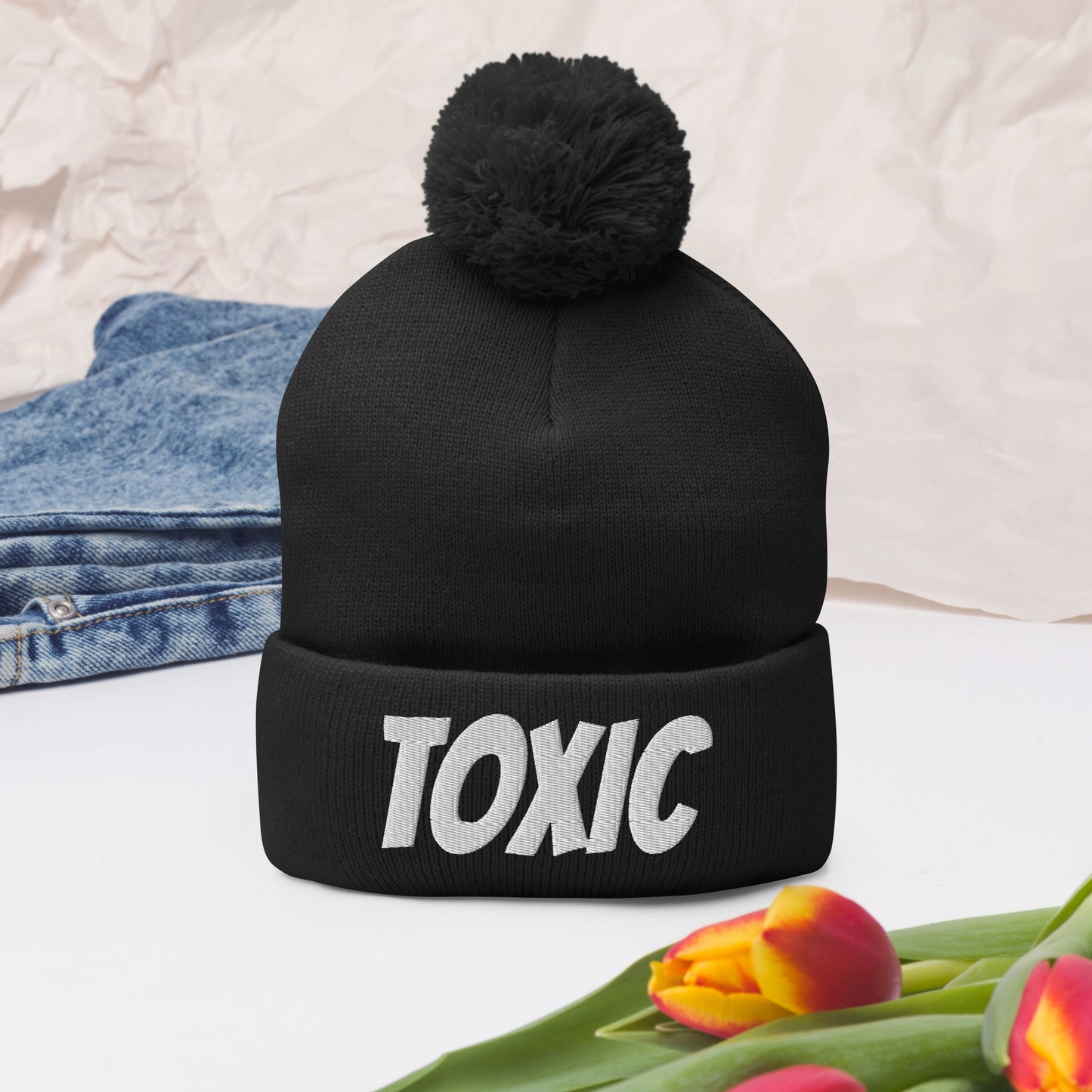 TOXIC Pom-Pom Beanie