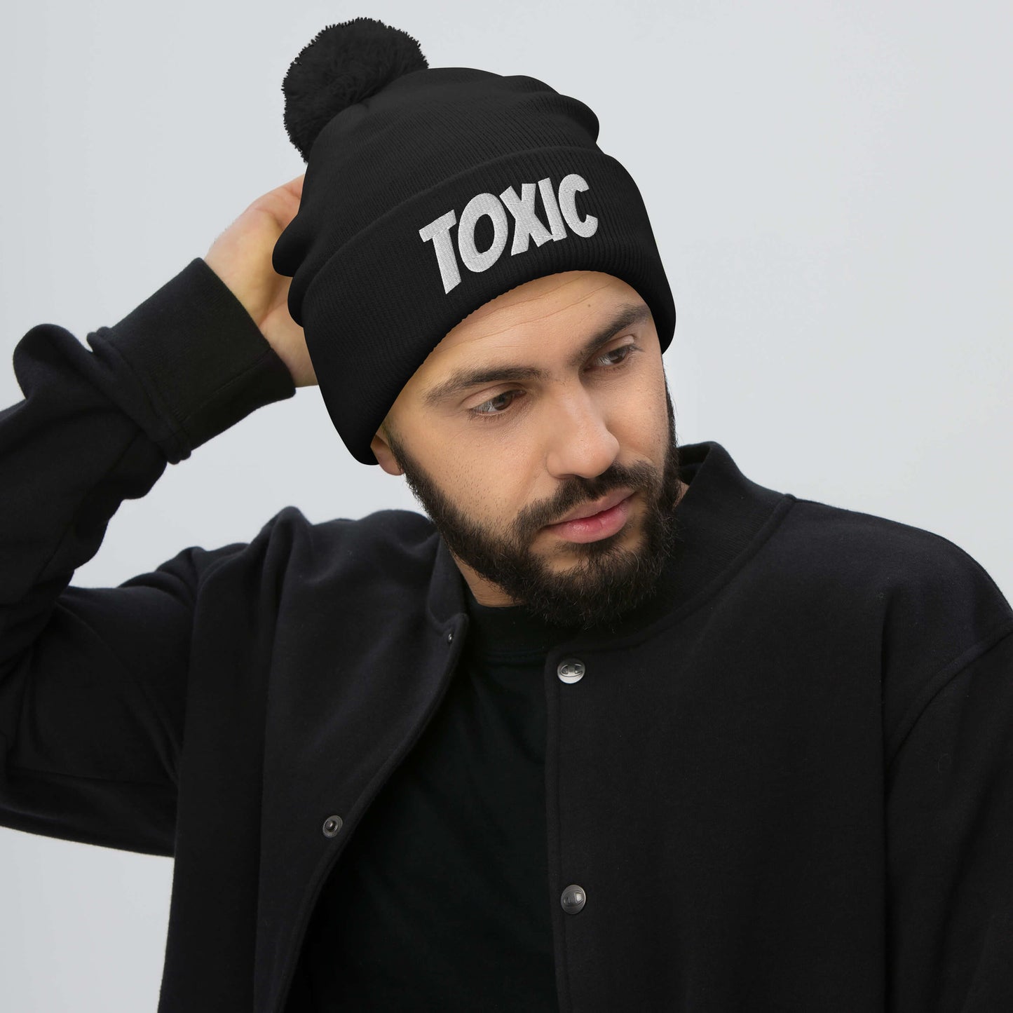 TOXIC Pom-Pom Beanie