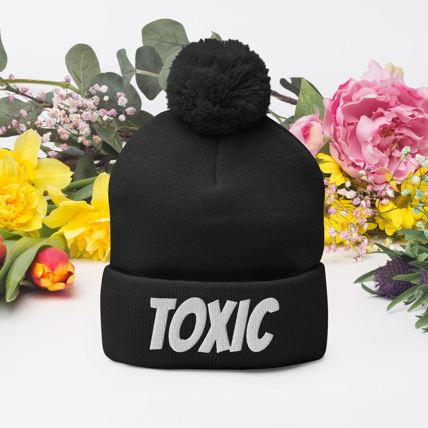 TOXIC Pom-Pom Beanie