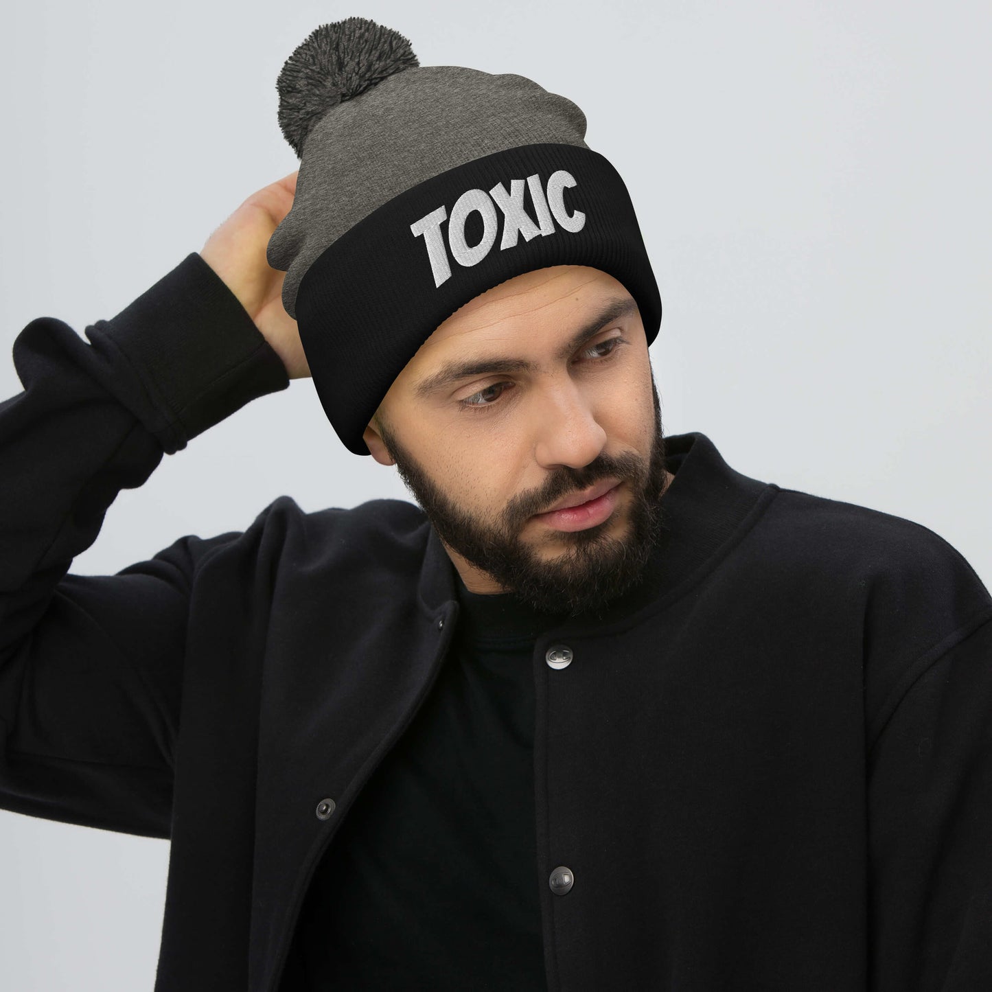 TOXIC Pom-Pom Beanie