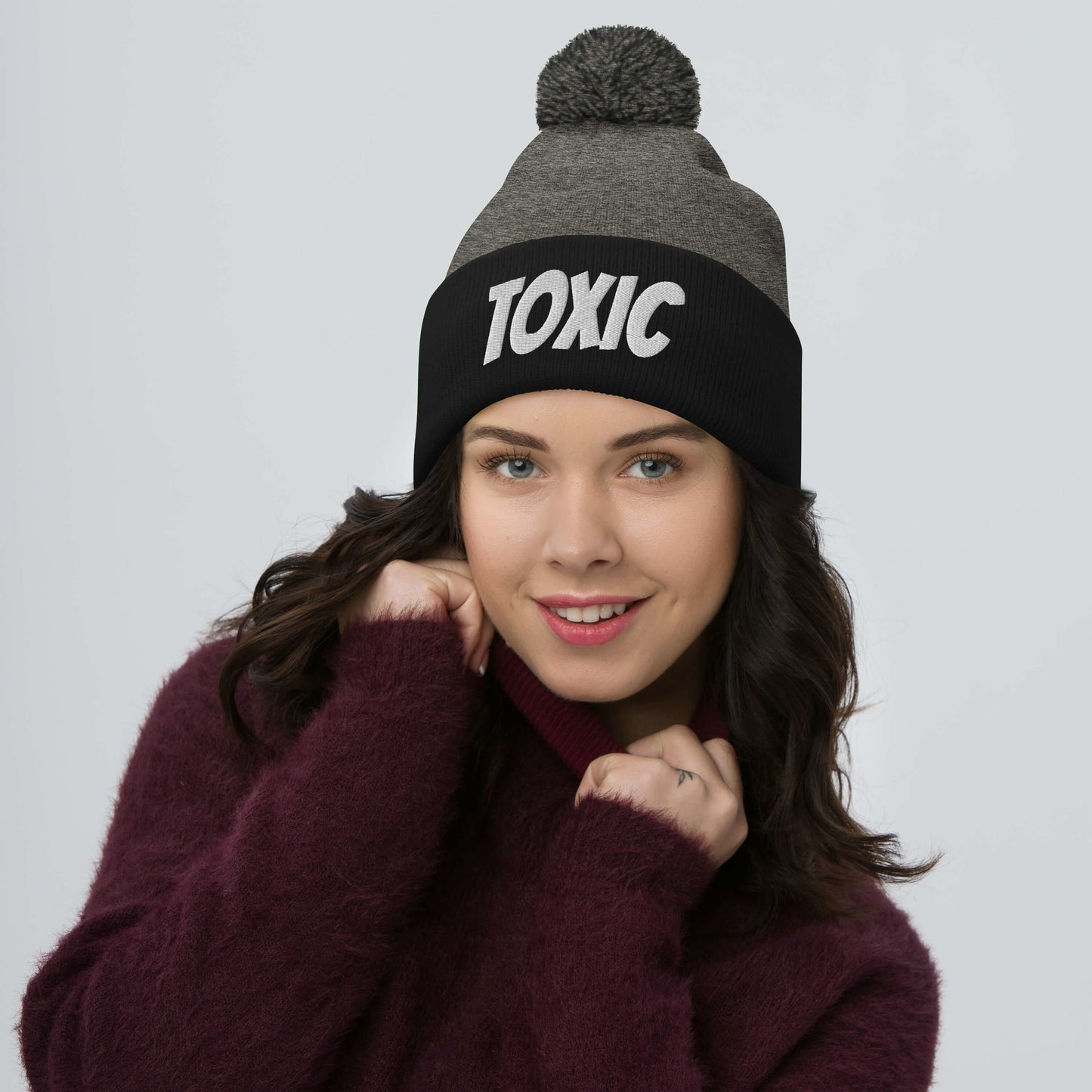 TOXIC Pom-Pom Beanie
