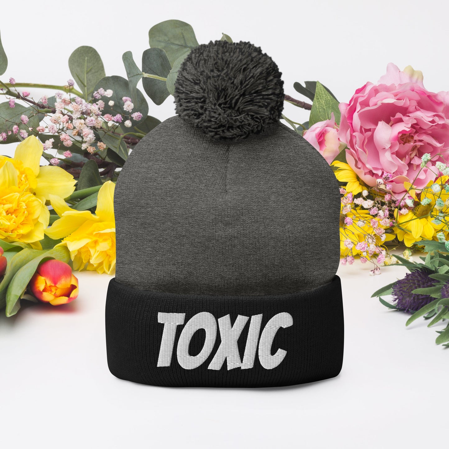 TOXIC Pom-Pom Beanie