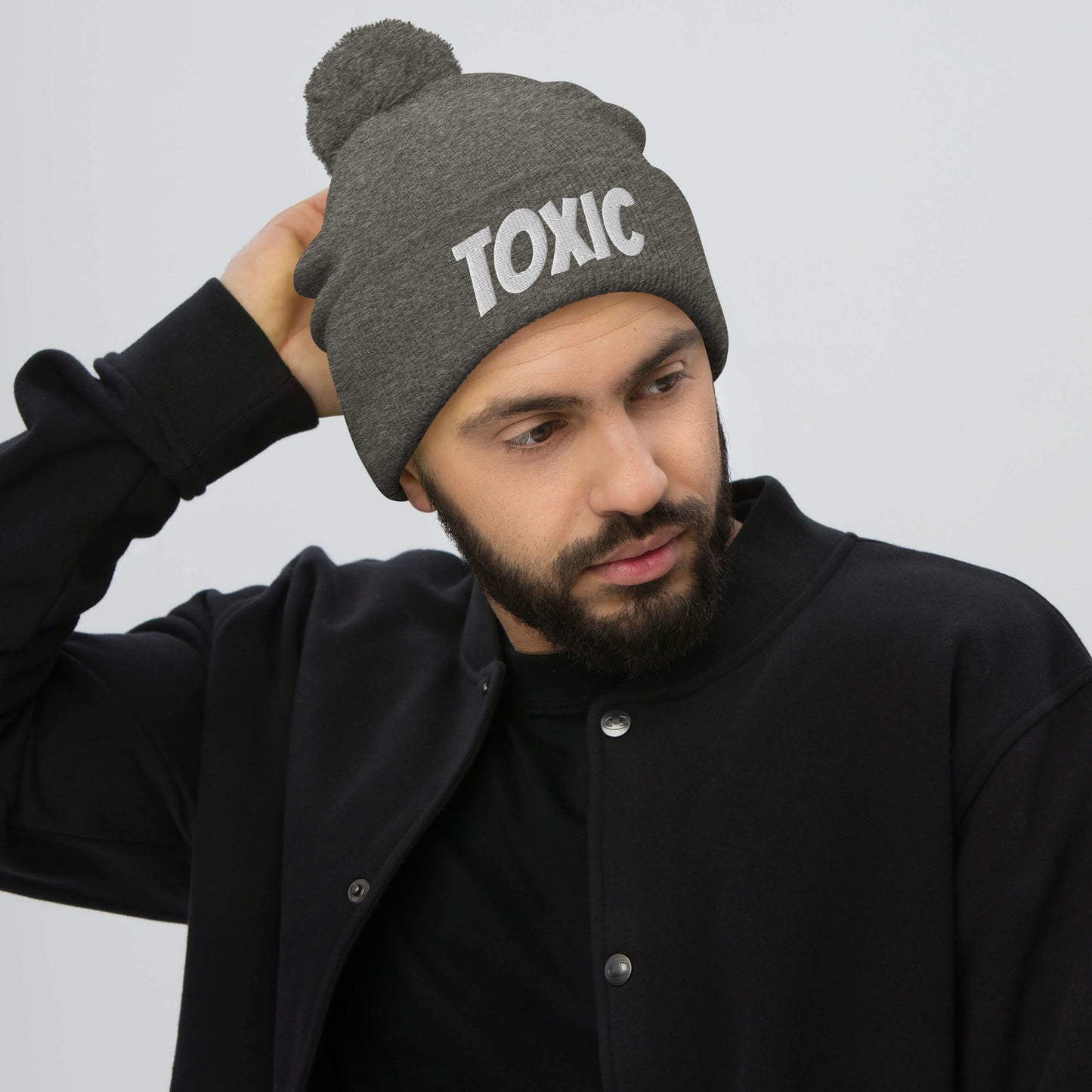 TOXIC Pom-Pom Beanie