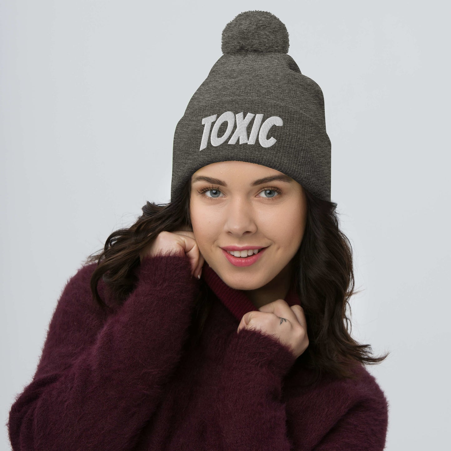 TOXIC Pom-Pom Beanie
