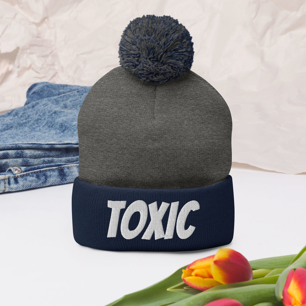 TOXIC Pom-Pom Beanie