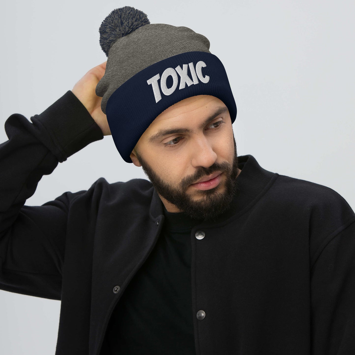TOXIC Pom-Pom Beanie
