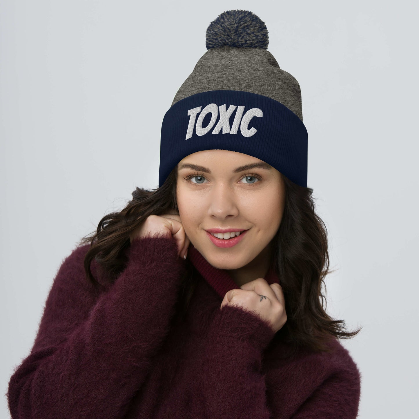 TOXIC Pom-Pom Beanie