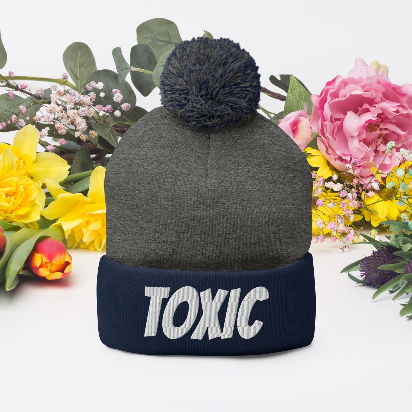 TOXIC Pom-Pom Beanie