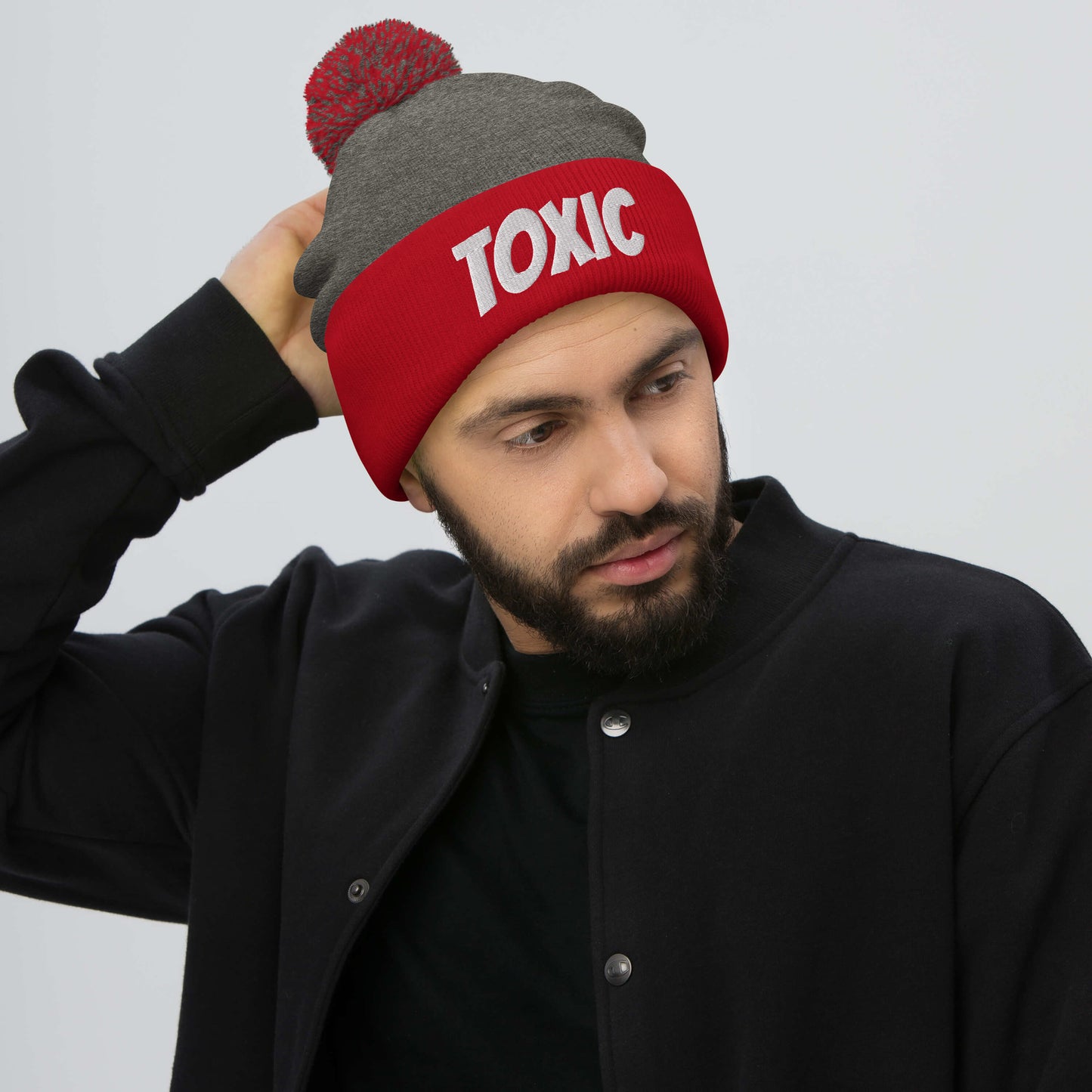 TOXIC Pom-Pom Beanie