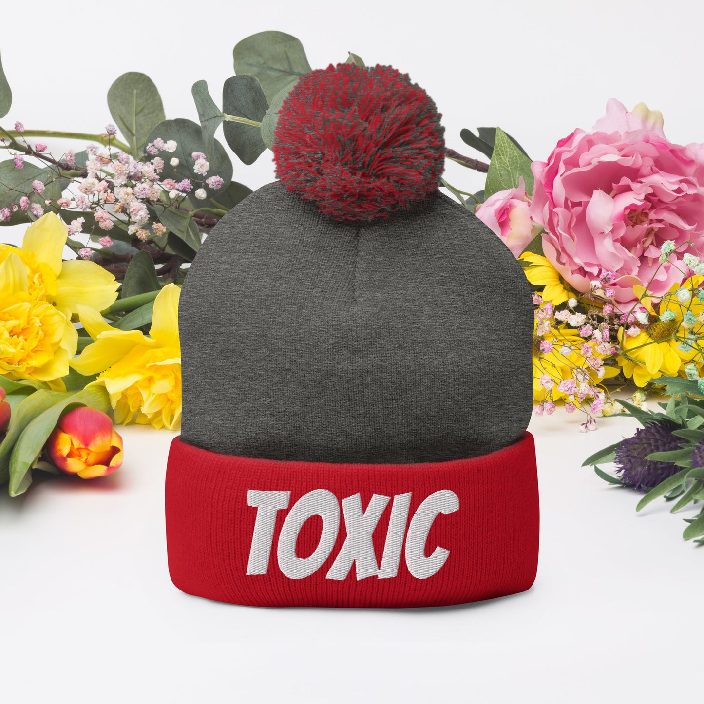 TOXIC Pom-Pom Beanie