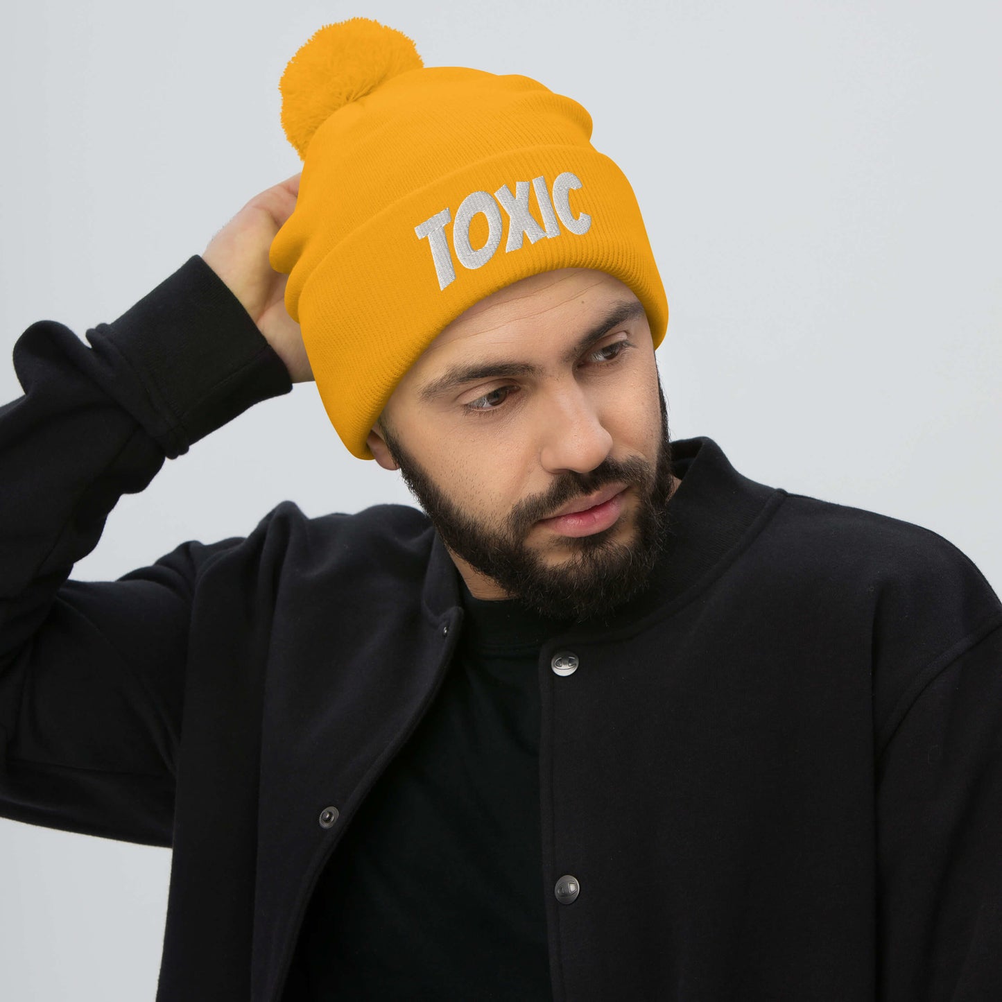 TOXIC Pom-Pom Beanie