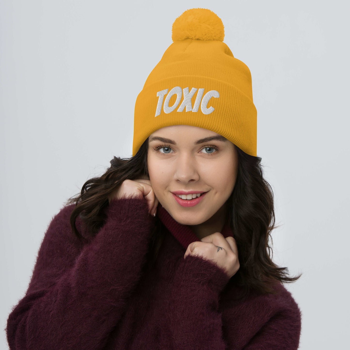TOXIC Pom-Pom Beanie