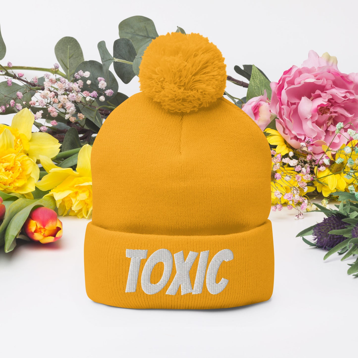 TOXIC Pom-Pom Beanie
