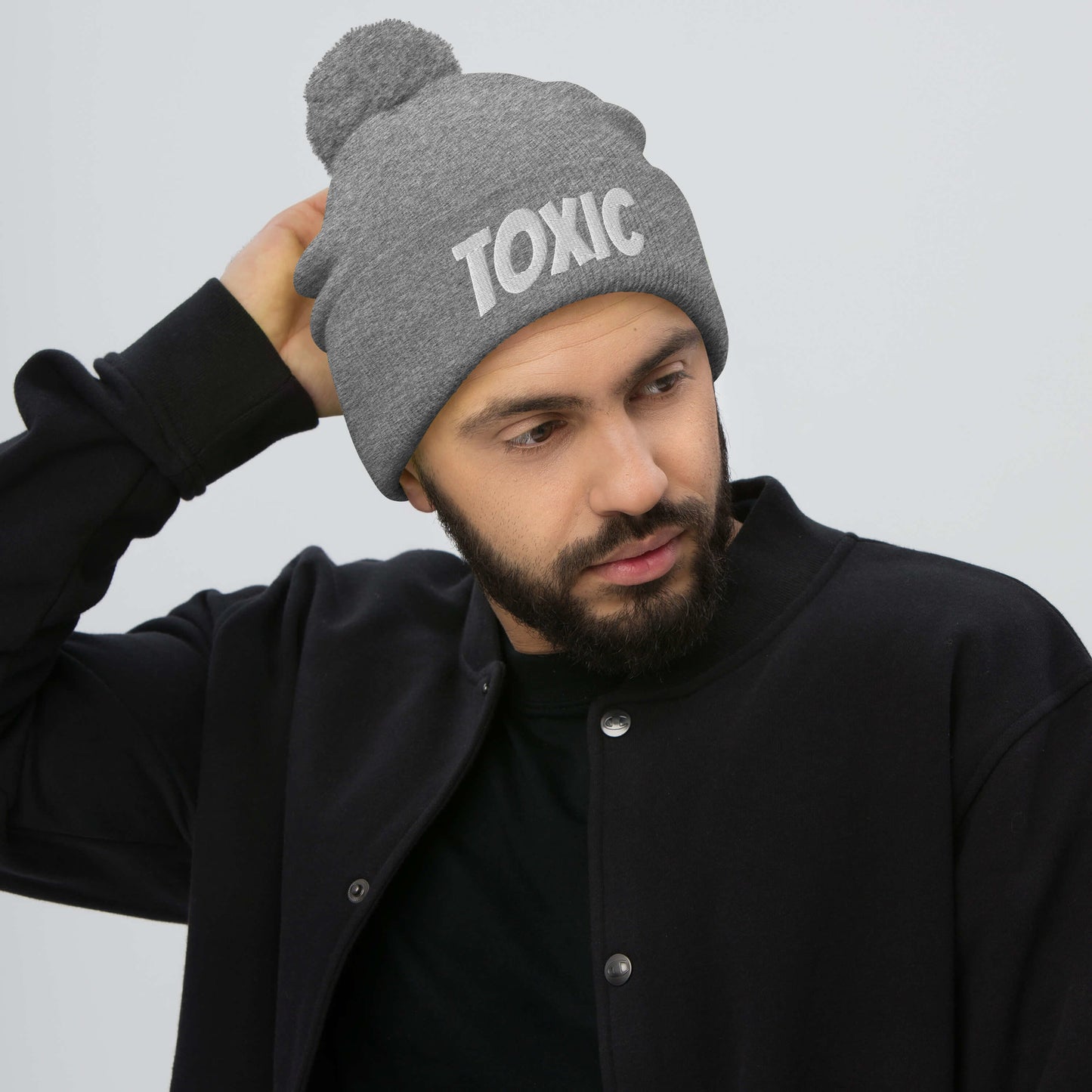 TOXIC Pom-Pom Beanie