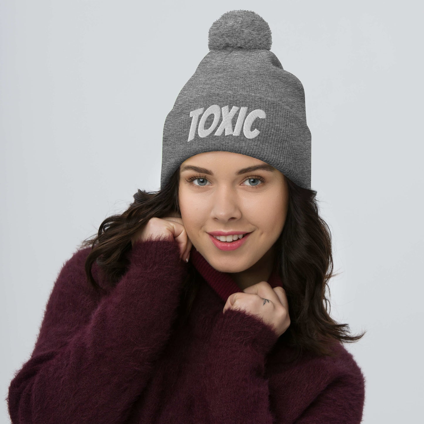 TOXIC Pom-Pom Beanie