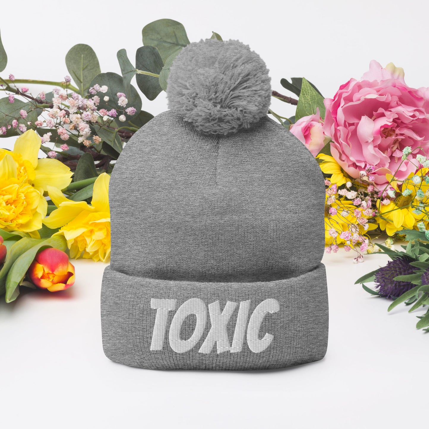 TOXIC Pom-Pom Beanie