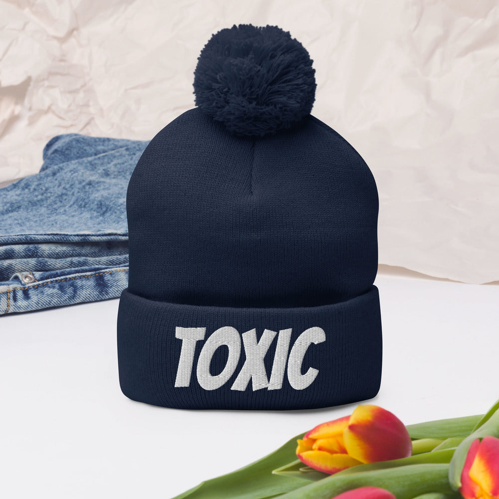 TOXIC Pom-Pom Beanie