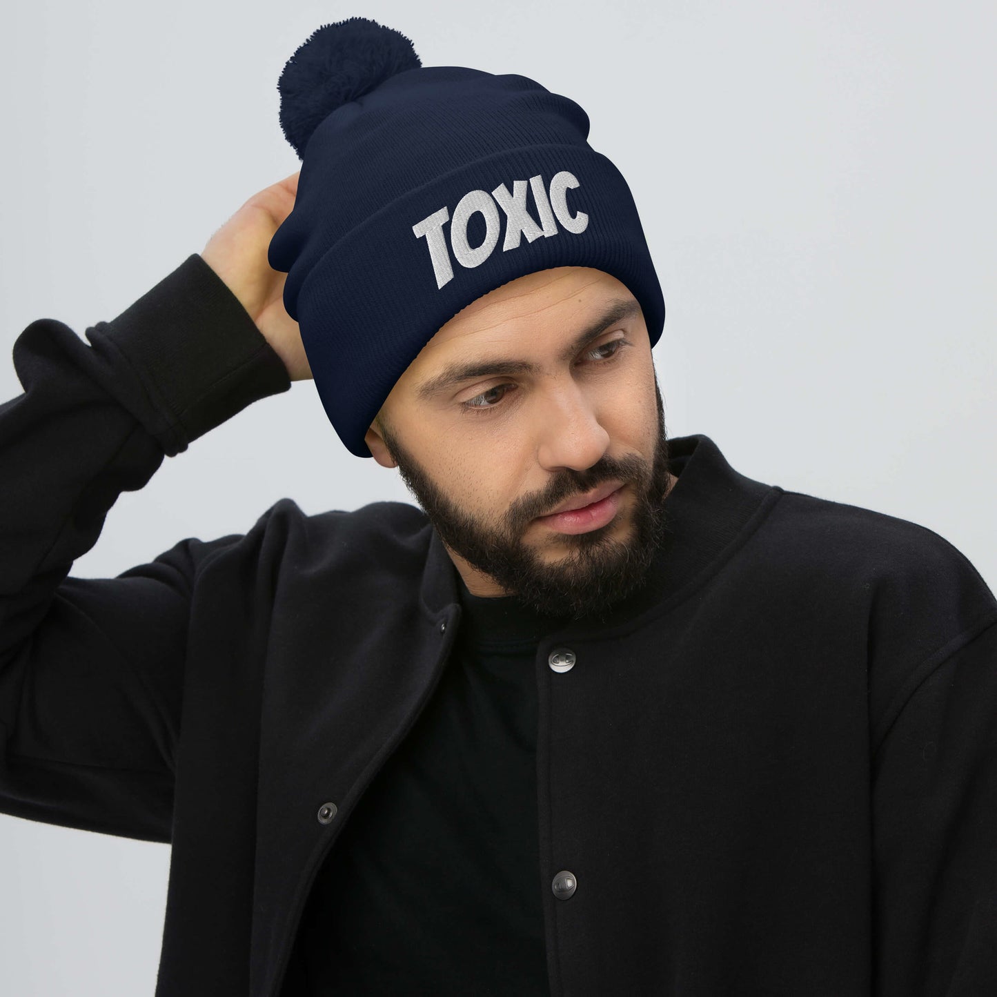TOXIC Pom-Pom Beanie