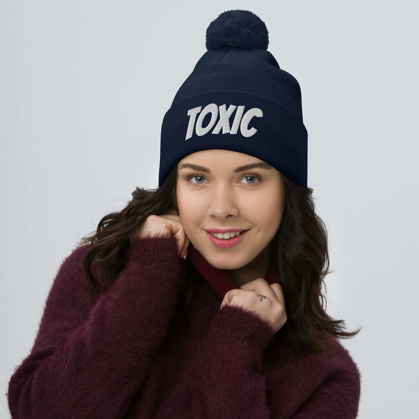 TOXIC Pom-Pom Beanie