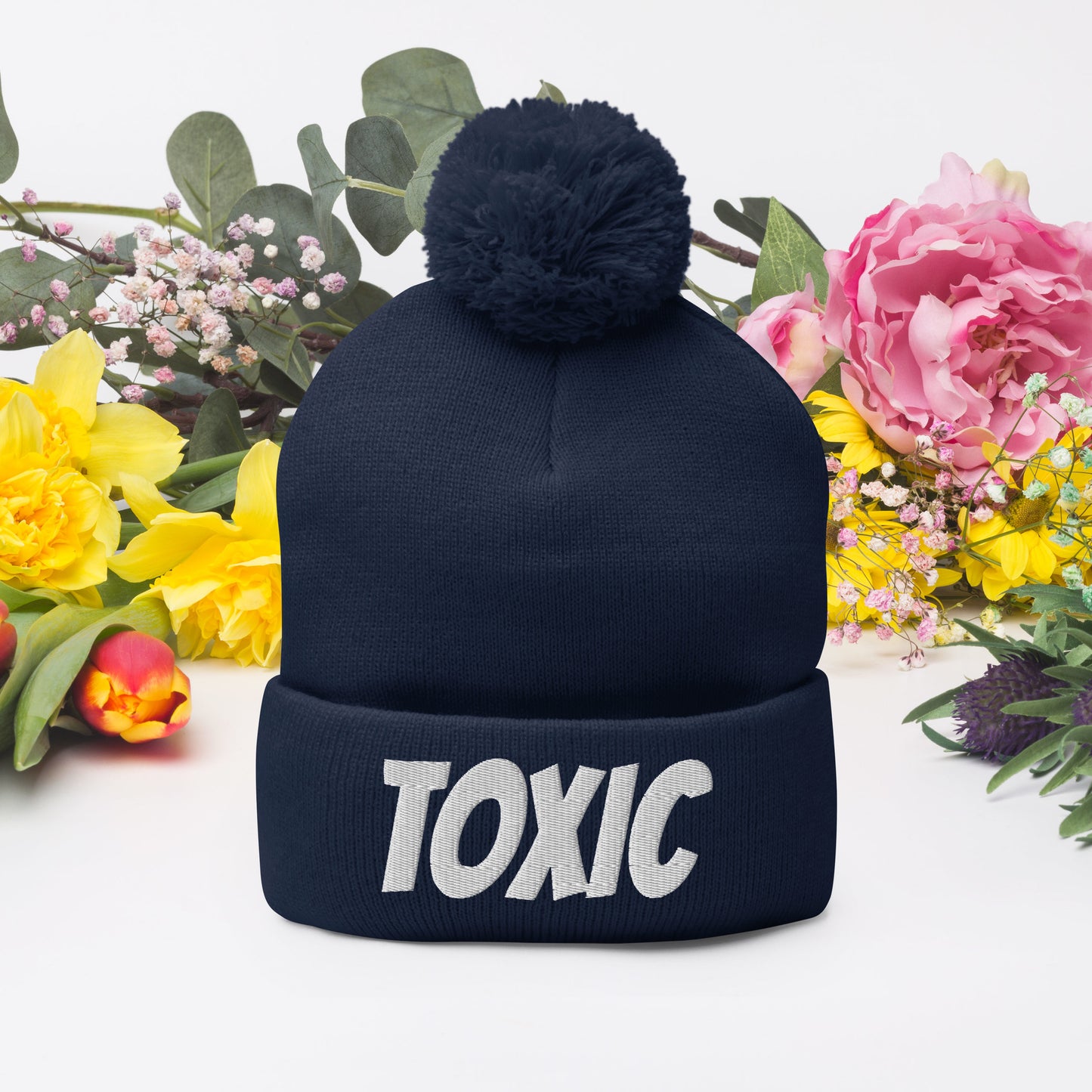 TOXIC Pom-Pom Beanie