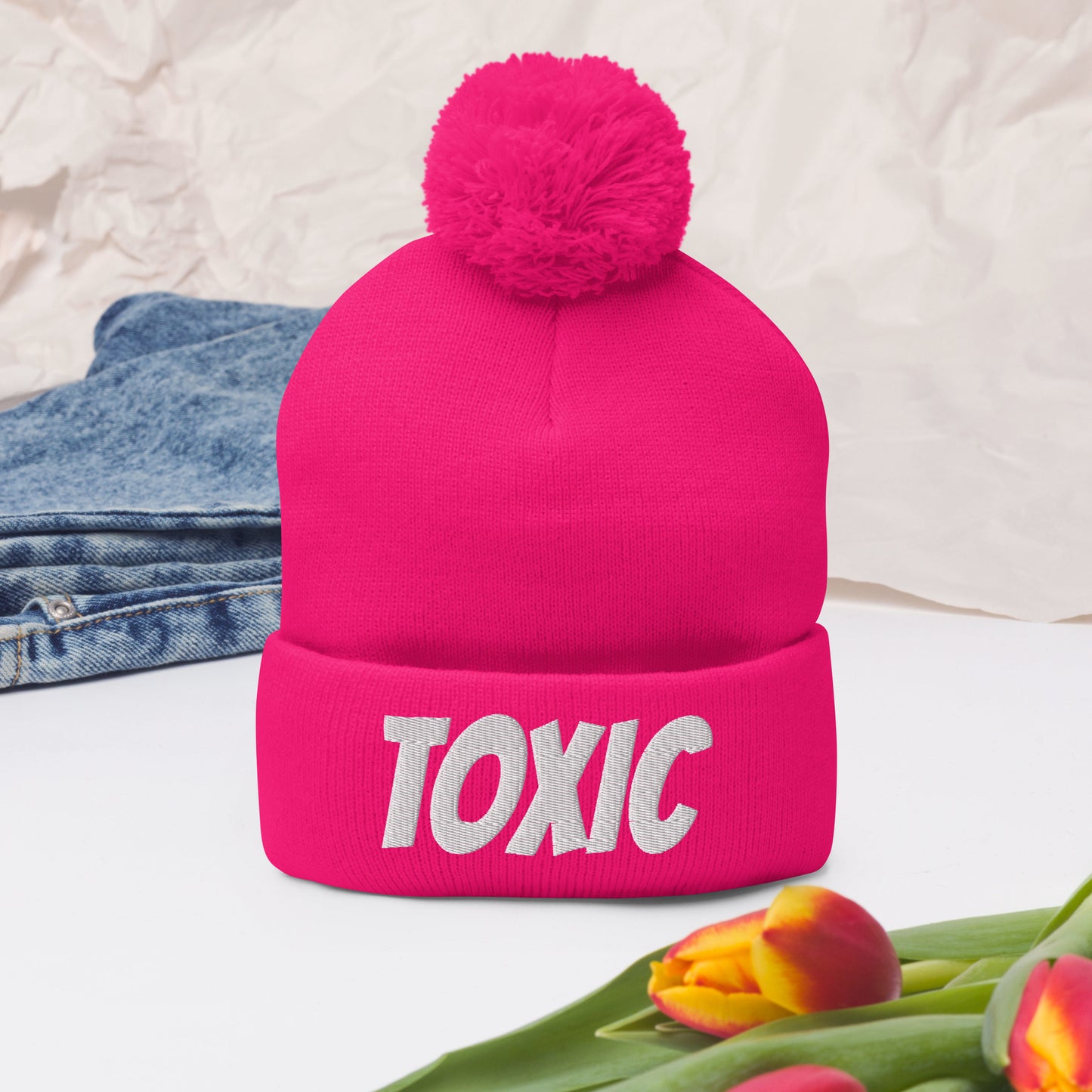 TOXIC Pom-Pom Beanie