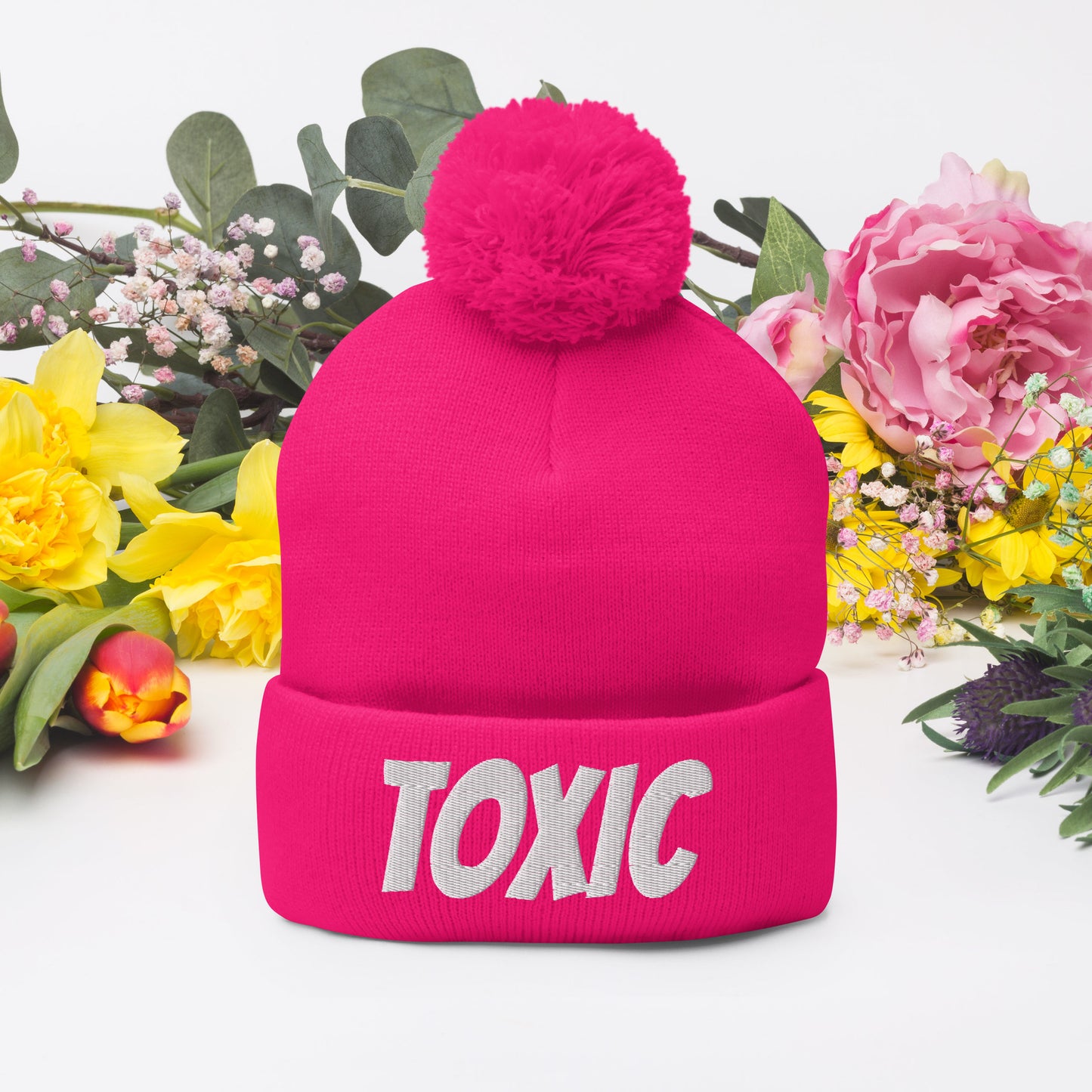 TOXIC Pom-Pom Beanie
