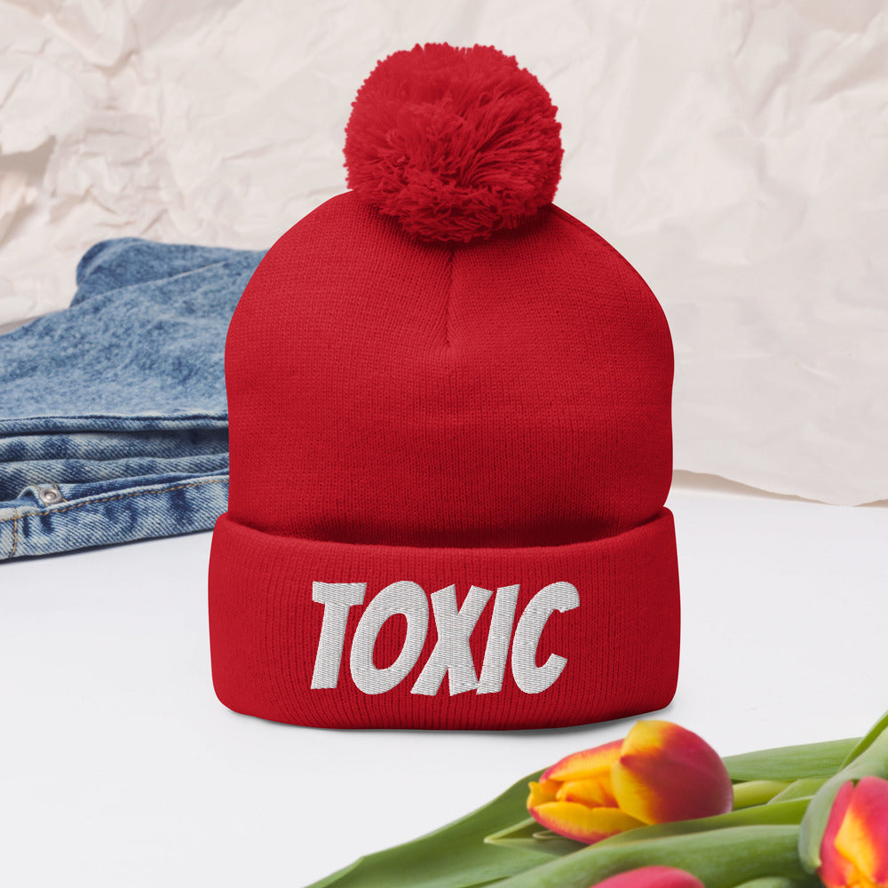 TOXIC Pom-Pom Beanie