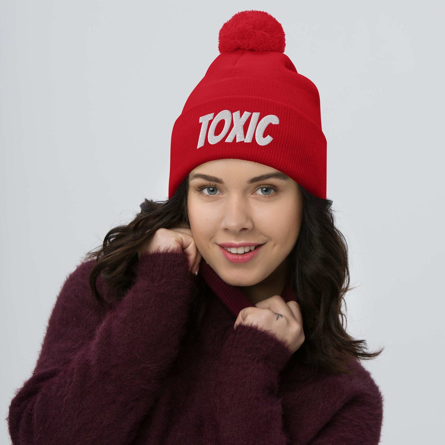 TOXIC Pom-Pom Beanie