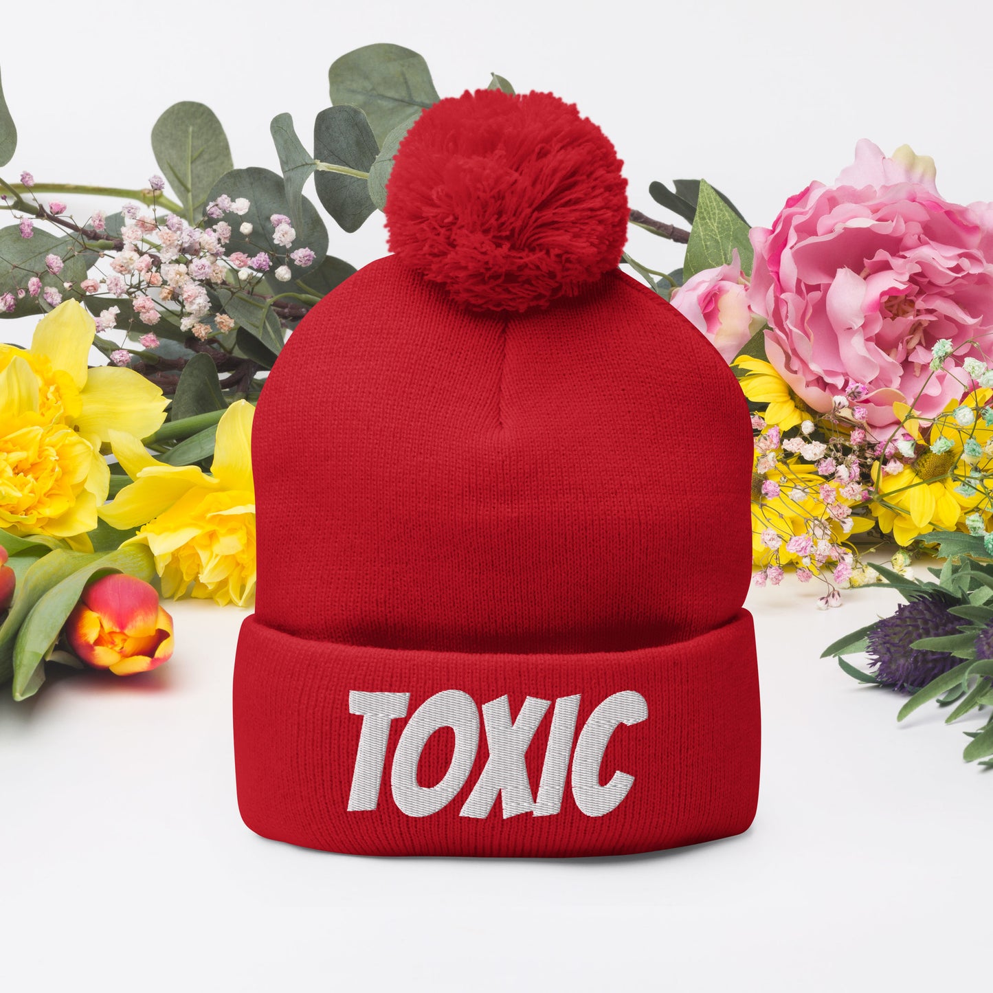 TOXIC Pom-Pom Beanie