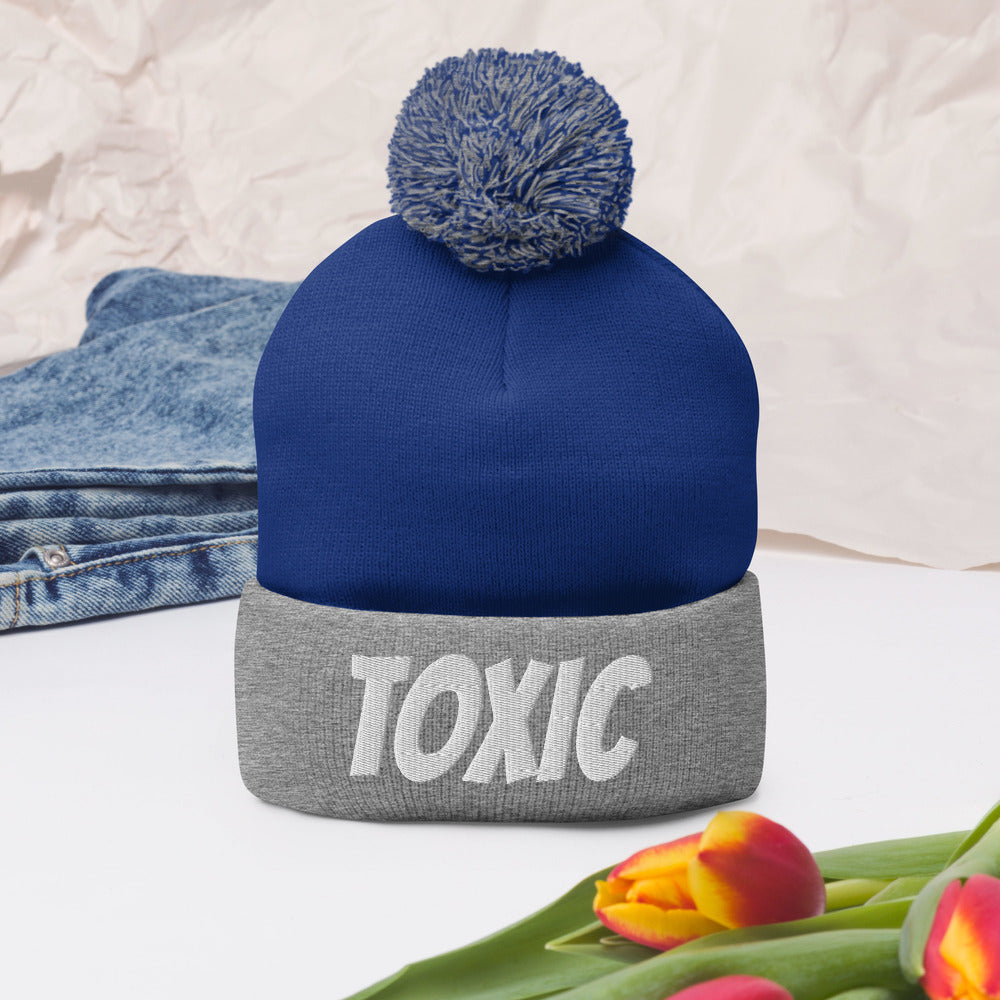 TOXIC Pom-Pom Beanie