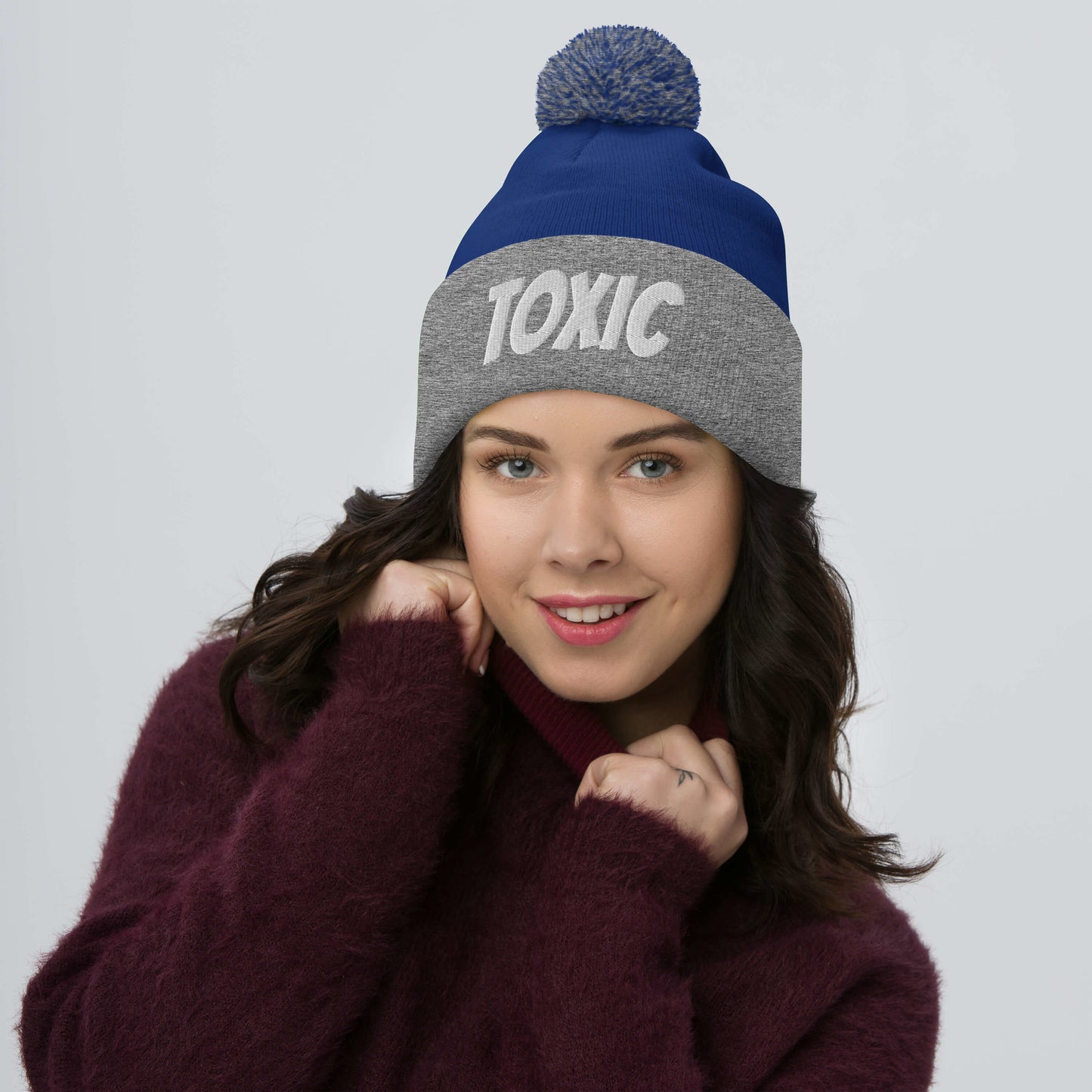 TOXIC Pom-Pom Beanie