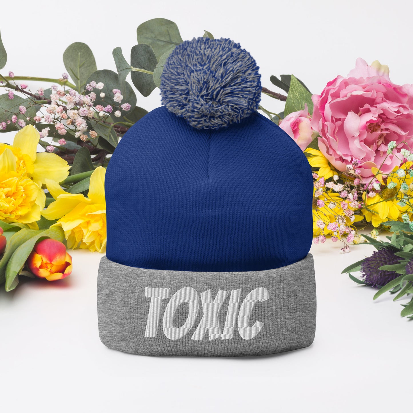 TOXIC Pom-Pom Beanie